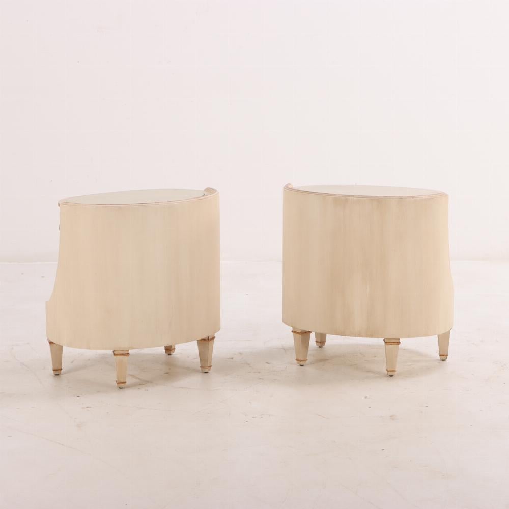 Pair of large Italian painted and giltwood oval nightstands, C 1950. In Good Condition In Philadelphia, PA