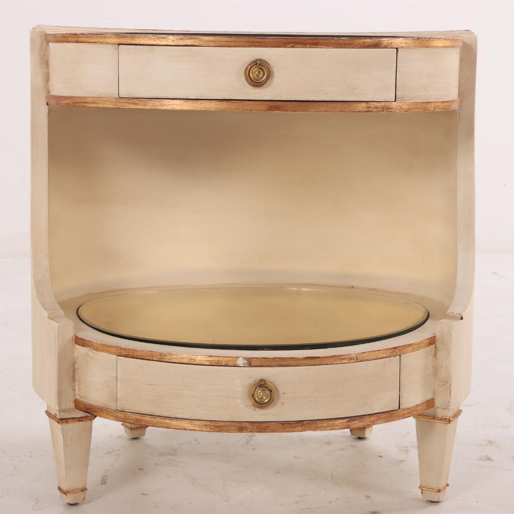 20th Century Pair of large Italian painted and giltwood oval nightstands, C 1950.