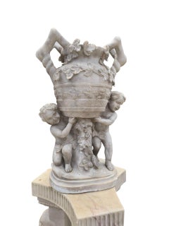 Pair of Large Italian White Marble Urns with Cherub Figures