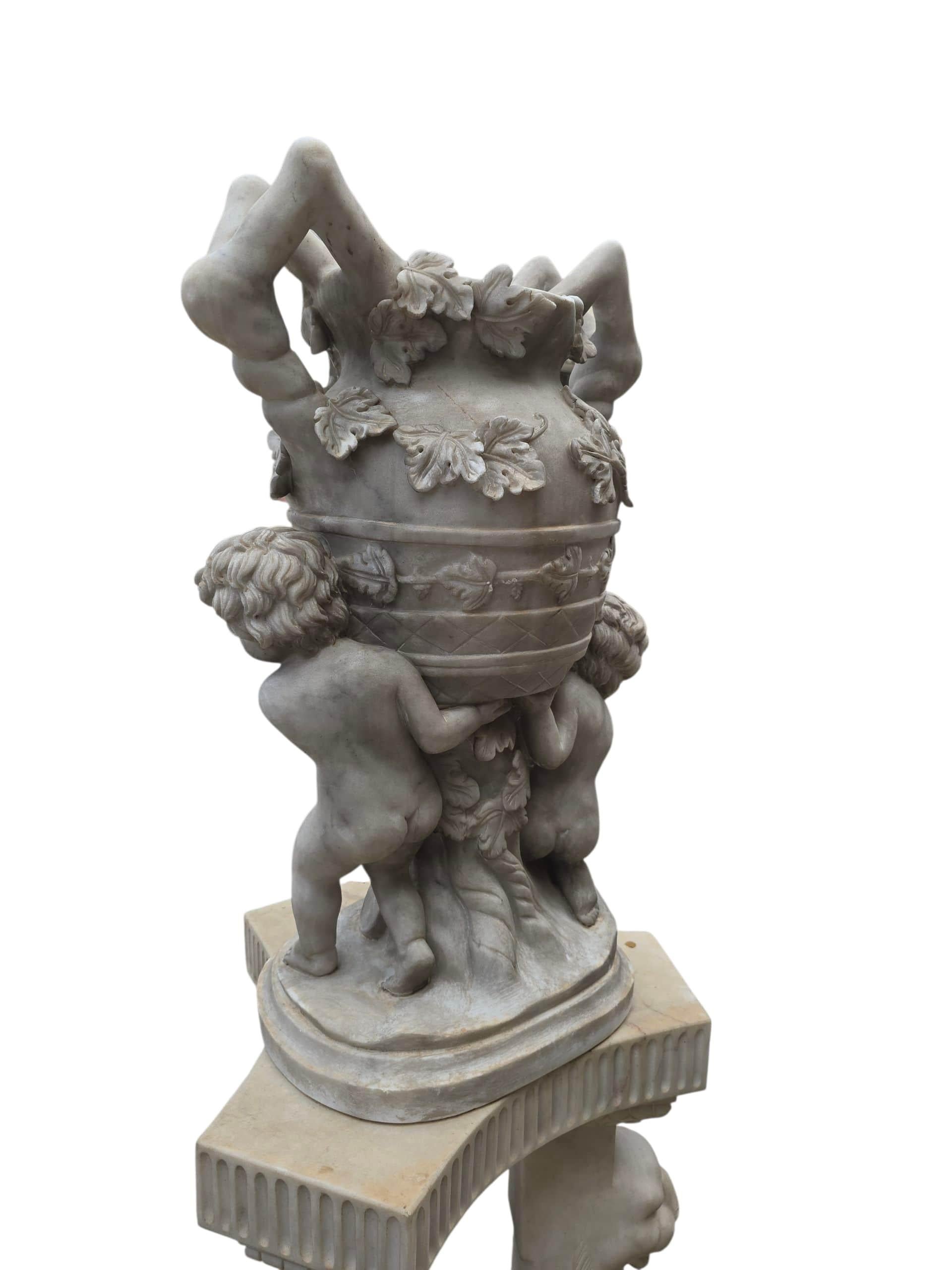 Late 20th Century Pair of Large Italian White Marble Urns with Cherub Figures For Sale