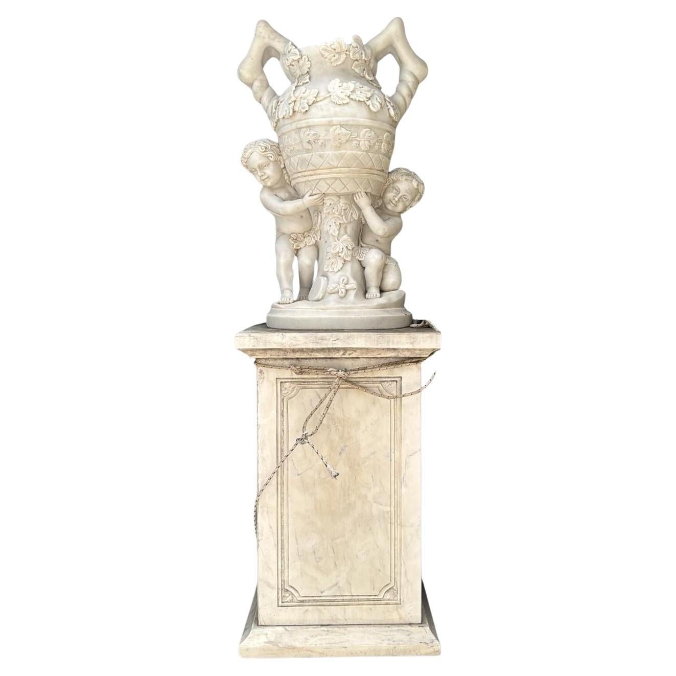 Pair of Large Italian White Marble Urns with Cherub Figures For Sale