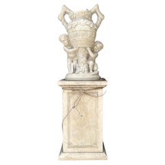 Pair of Large Italian White Marble Urns with Cherub Figures
