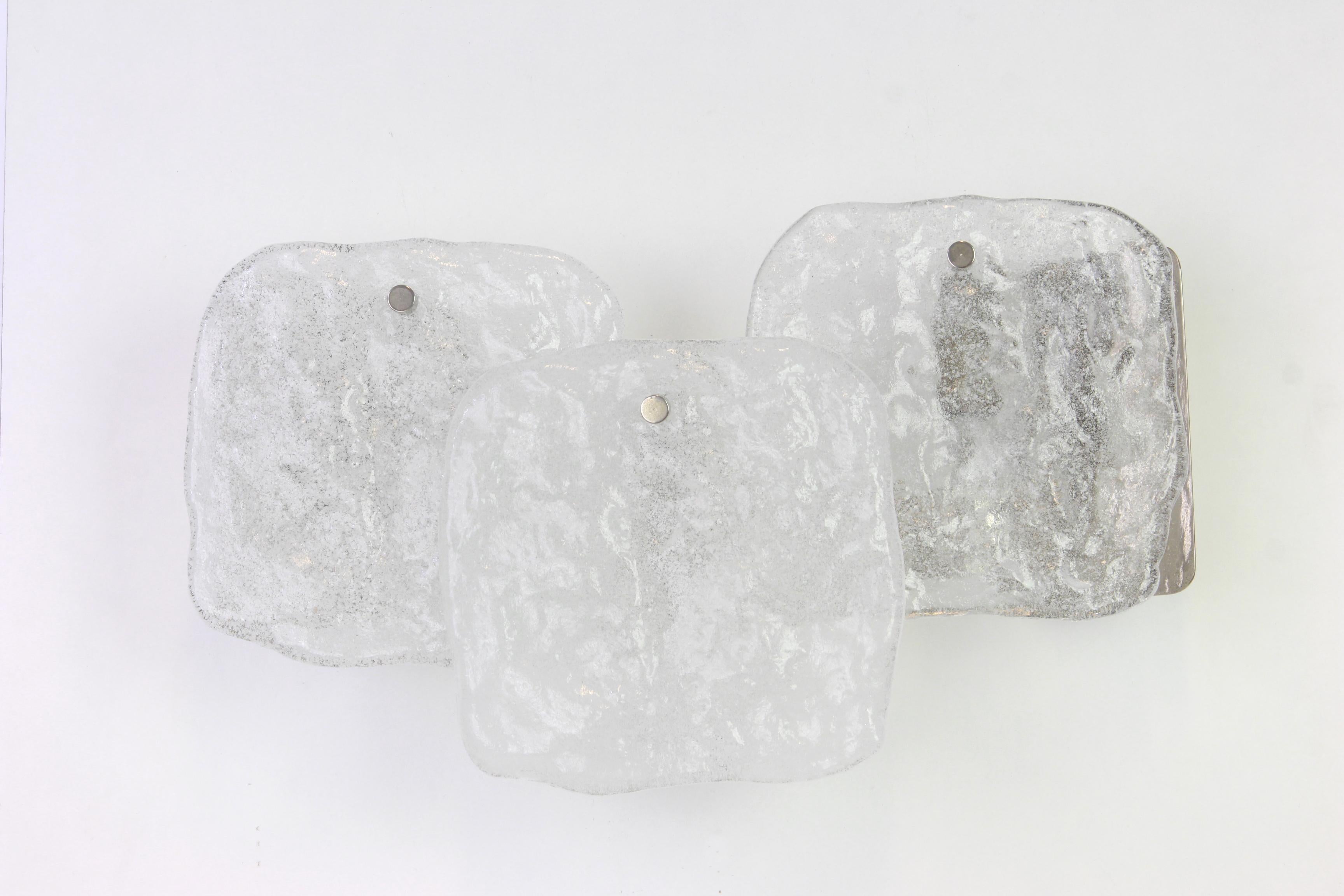 Fantastic midcentury wall sconces with 3 large Murano glass pieces in each lamp, made by Kalmar, Austria, manufactured, circa 1960-1969.
Great geometrical shape. 
Each sconce needs three x E14 small bulbs, and they are also compatible with the