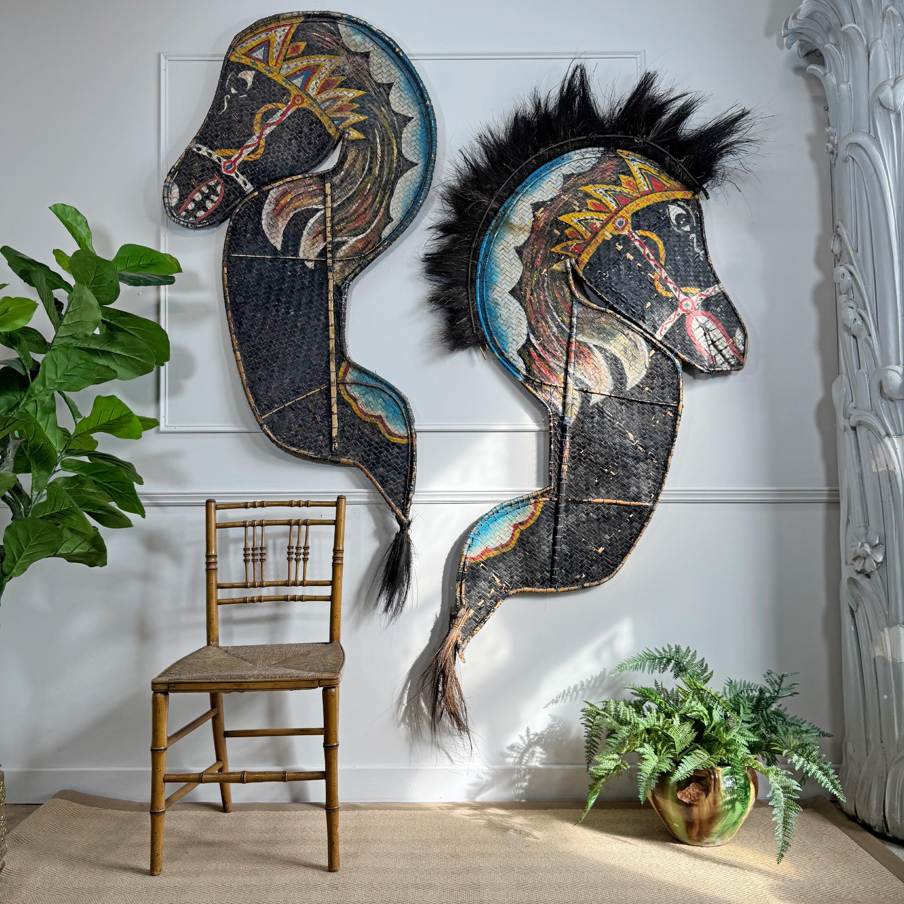 A stunning and ornate pair of circa 1950 Kuda Lumping painted ceremonial horses, hand crafted these enormous horses have been used for over a century in the Javanese Kuda Lumping dances, the dancers perform using rattan horses, generally colourful