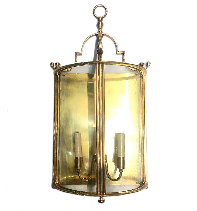 A pair of large circa 1920s French bronze demilune lantern sconces with interior cluster of lights.

Measurements:
Height 25.75