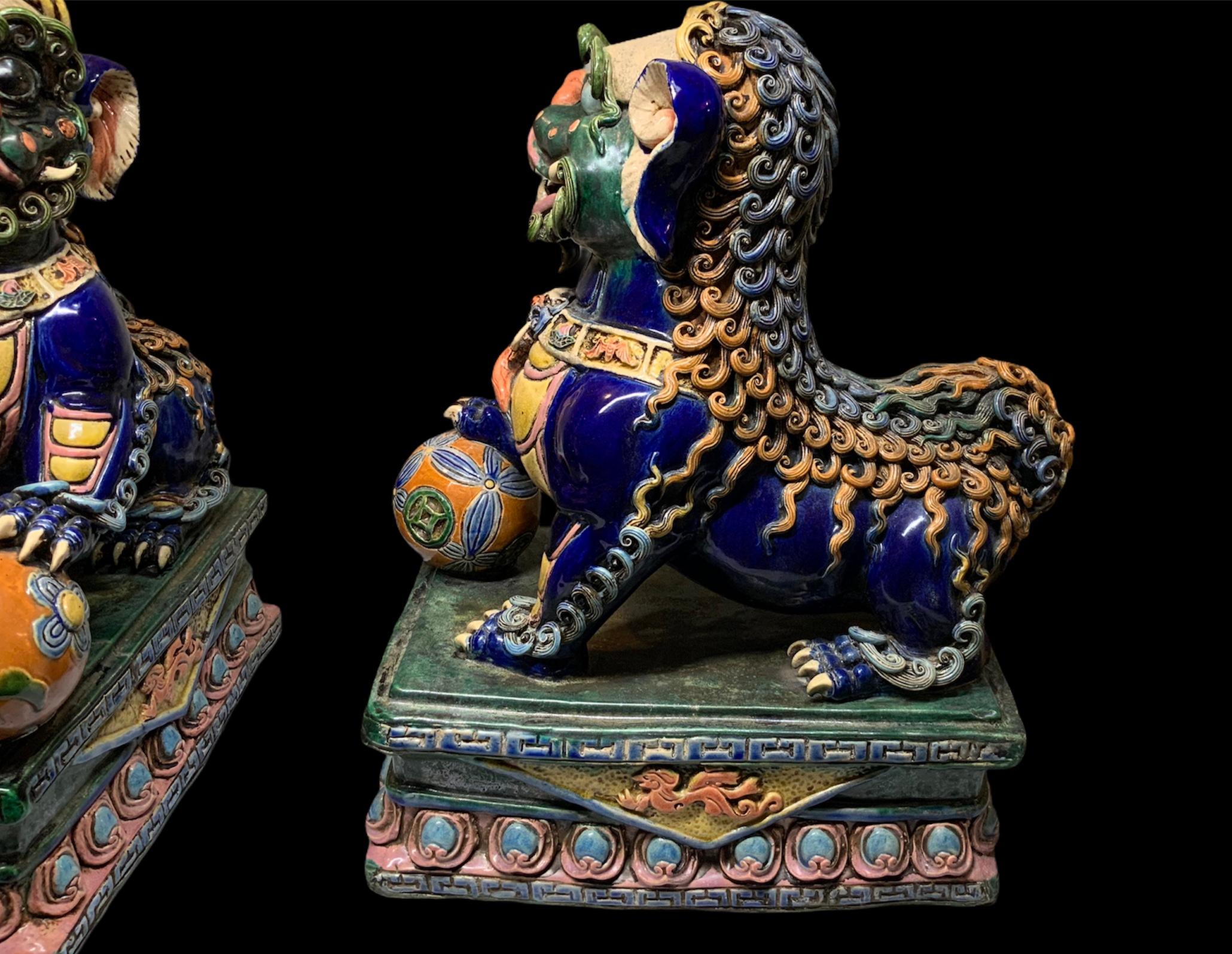 20th Century Pair of Large Lively Buddha’s Lions / Foo Dogs Ceramic Sculptures