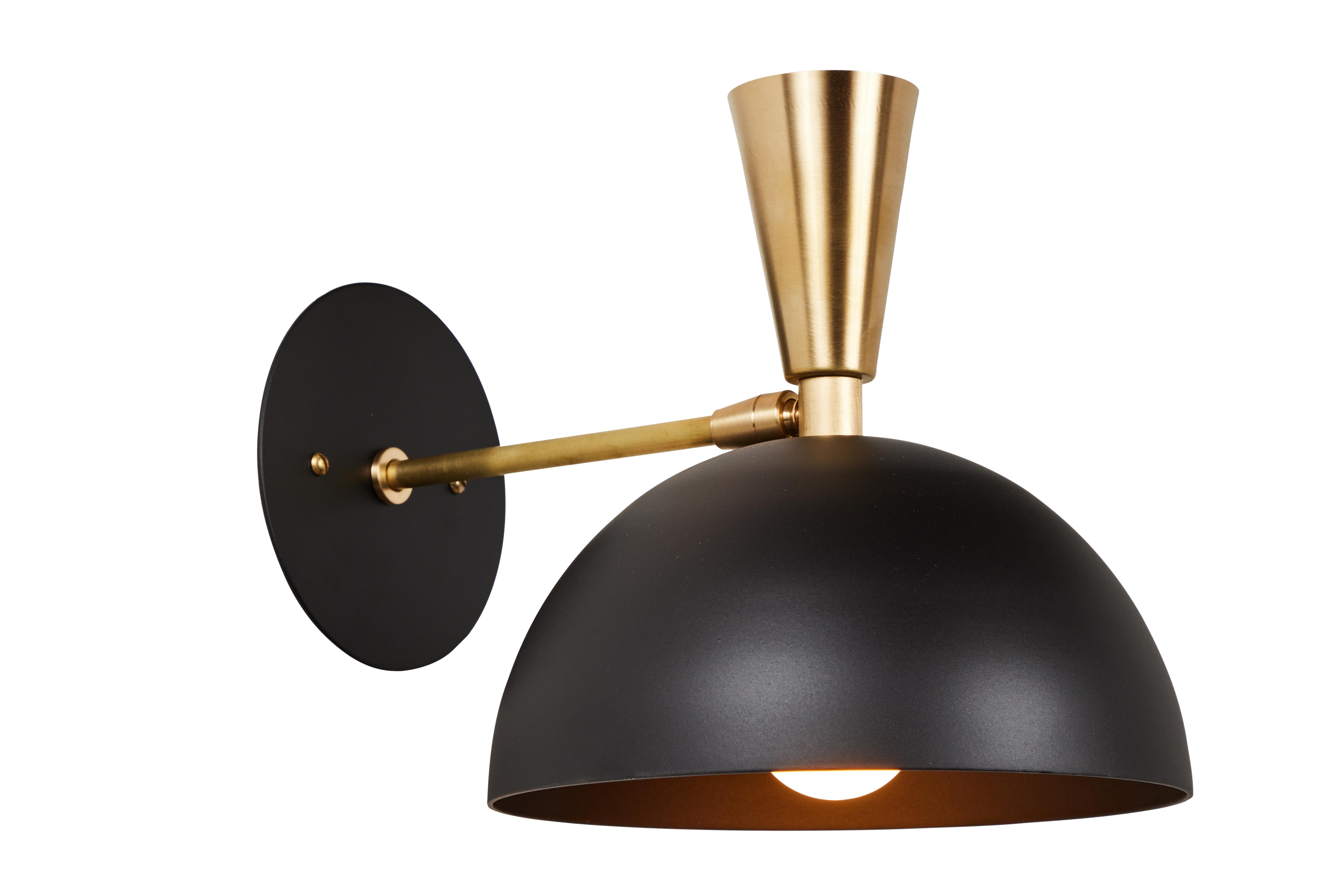 Pair of large 'Lola II' sconces in black metal and brass. 

Hand-fabricated by Los Angeles based designer and lighting professional Alvaro Benitez, these highly refined sconces are reminiscent of the iconic midcentury Italian designs of Arteluce and