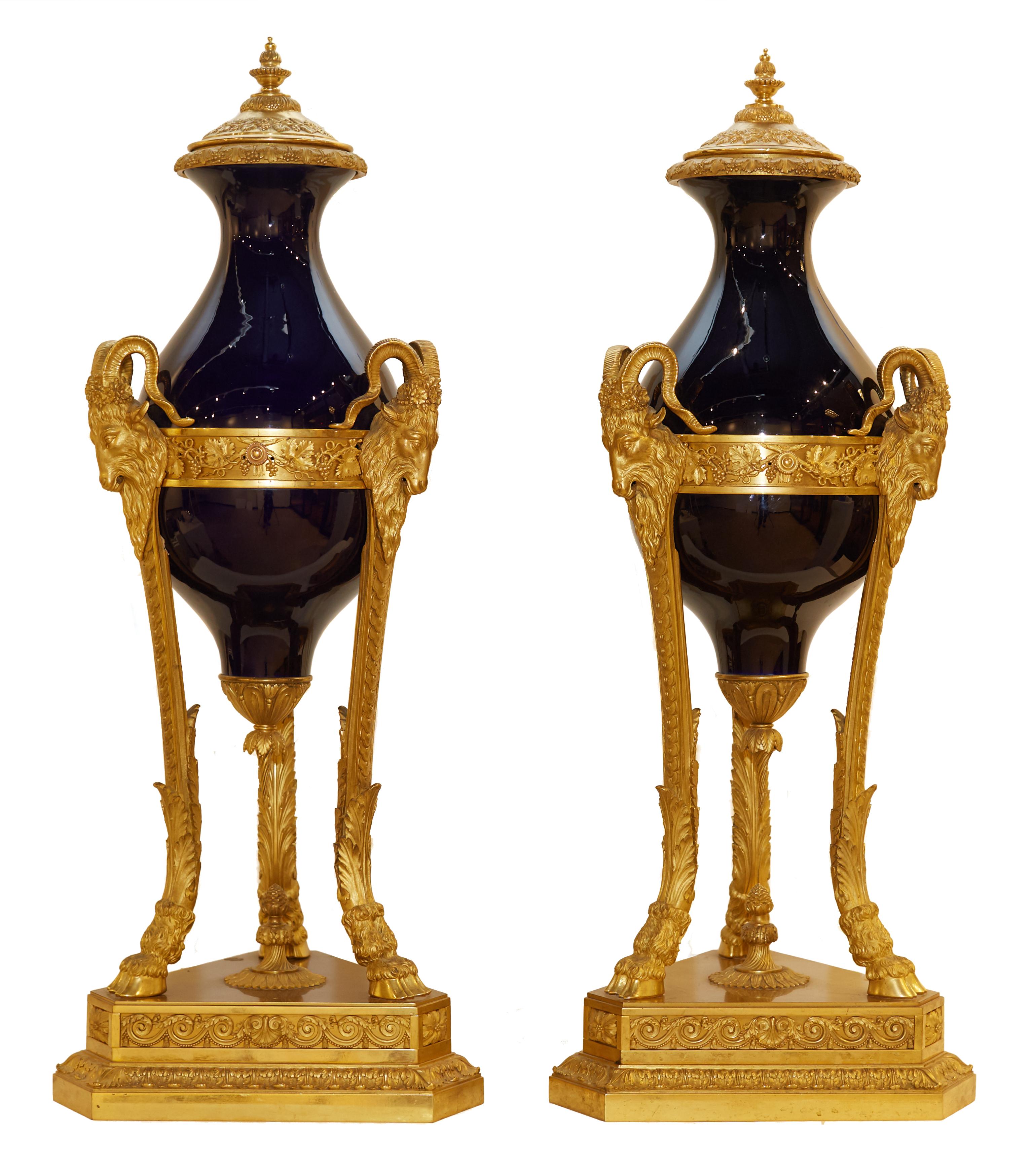 Pair of finest quality and palatial cobalt blue Sevres porcelain bronze mounted urns with ram's head motifs.
 