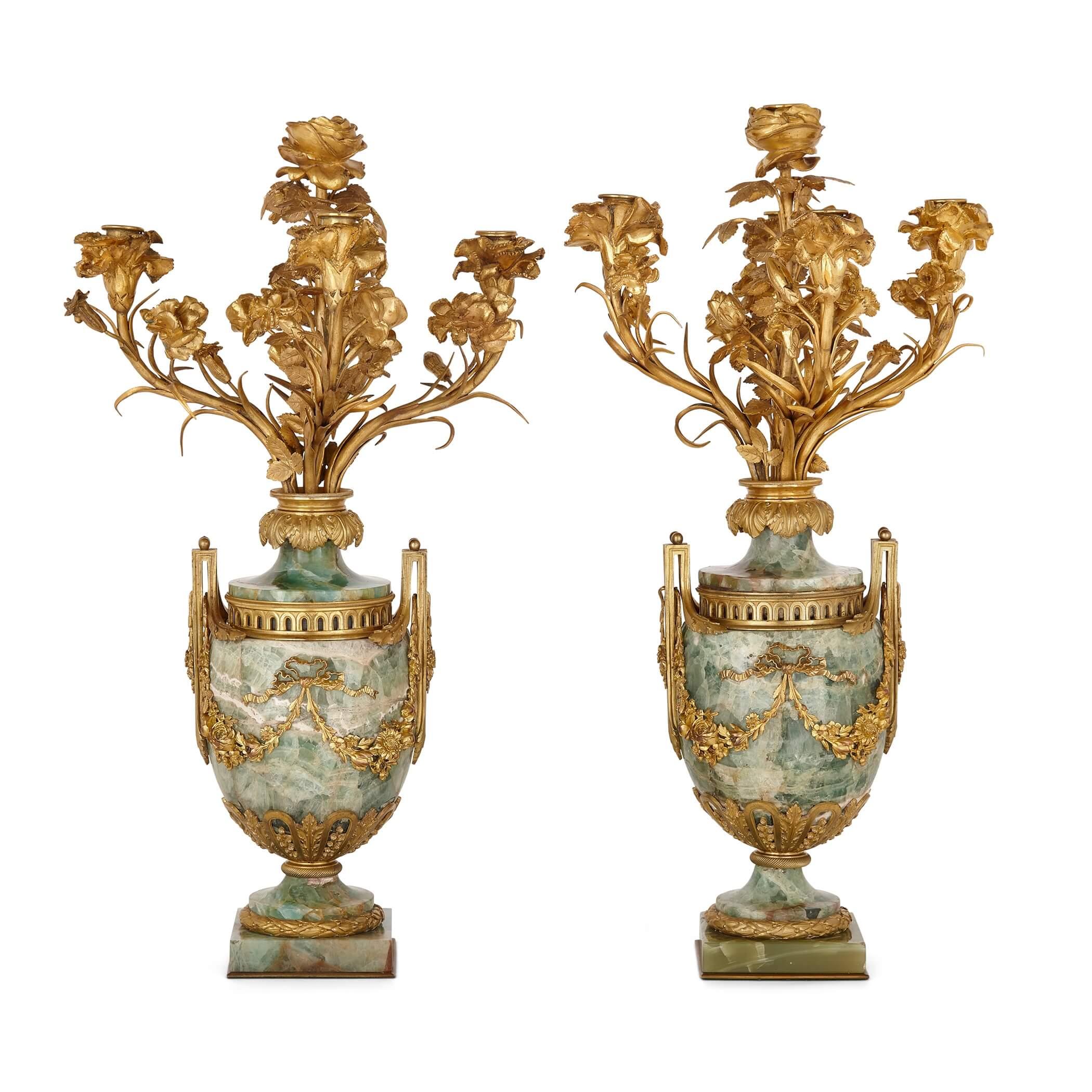 Pair of large Louis XVI style gilt bronze mounted fluorspar candelabra
French, 19th Century
Measures: Height 61cm, width 35cm, depth 34cm

Crafted in fine Neoclassical and Louis XVI style, these beautiful candelabra are made from the rare and