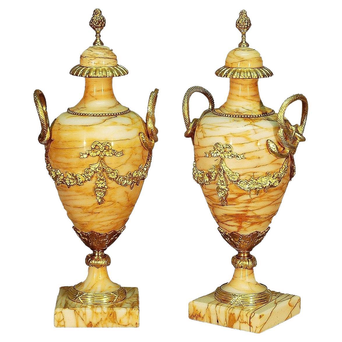 Paire de grands vases en marbre et bronze doré