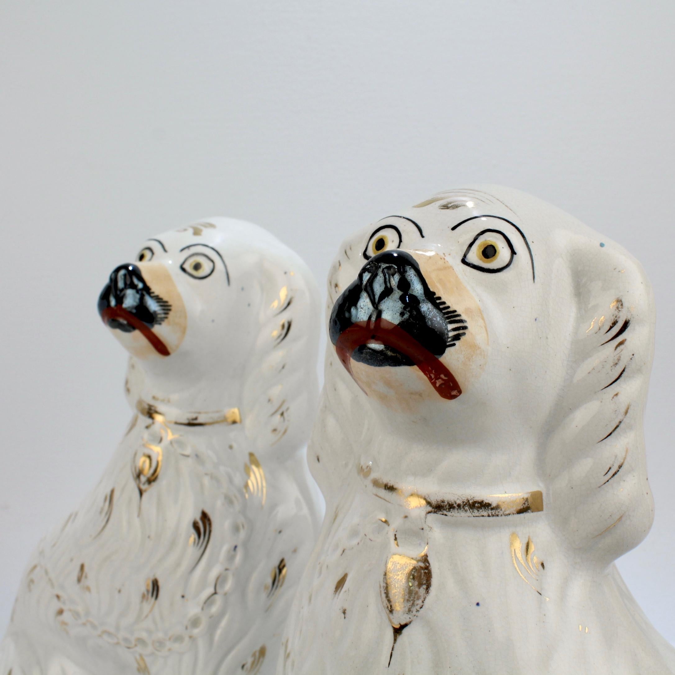 Pair of Large Matched Antique Staffordshire Pottery Spaniel Dog Figurines In Good Condition In Philadelphia, PA