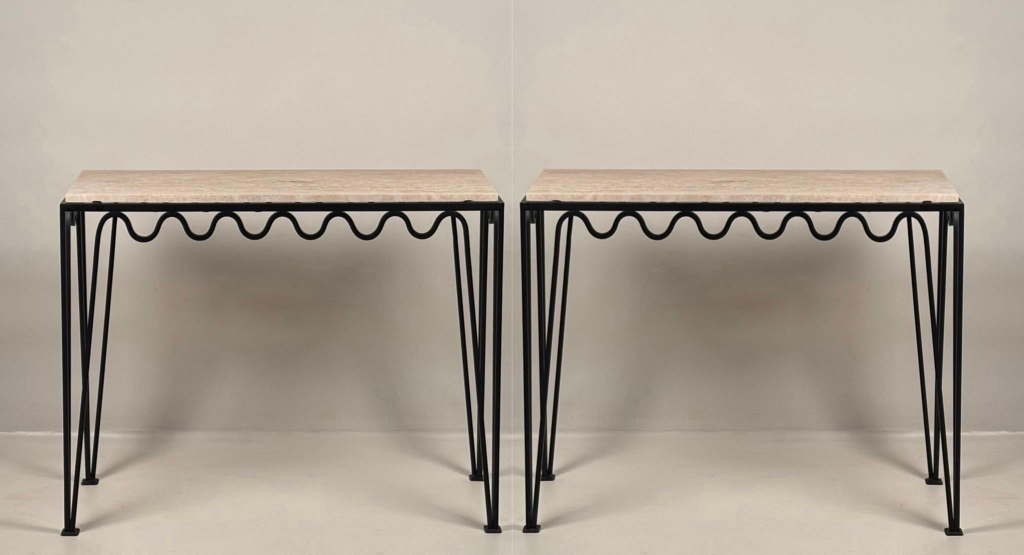 The large version of our 'Méandre' consoles by DESIGN FRÈRES. Honed travertine tops over a powder coated steel frames. Chic and understated.