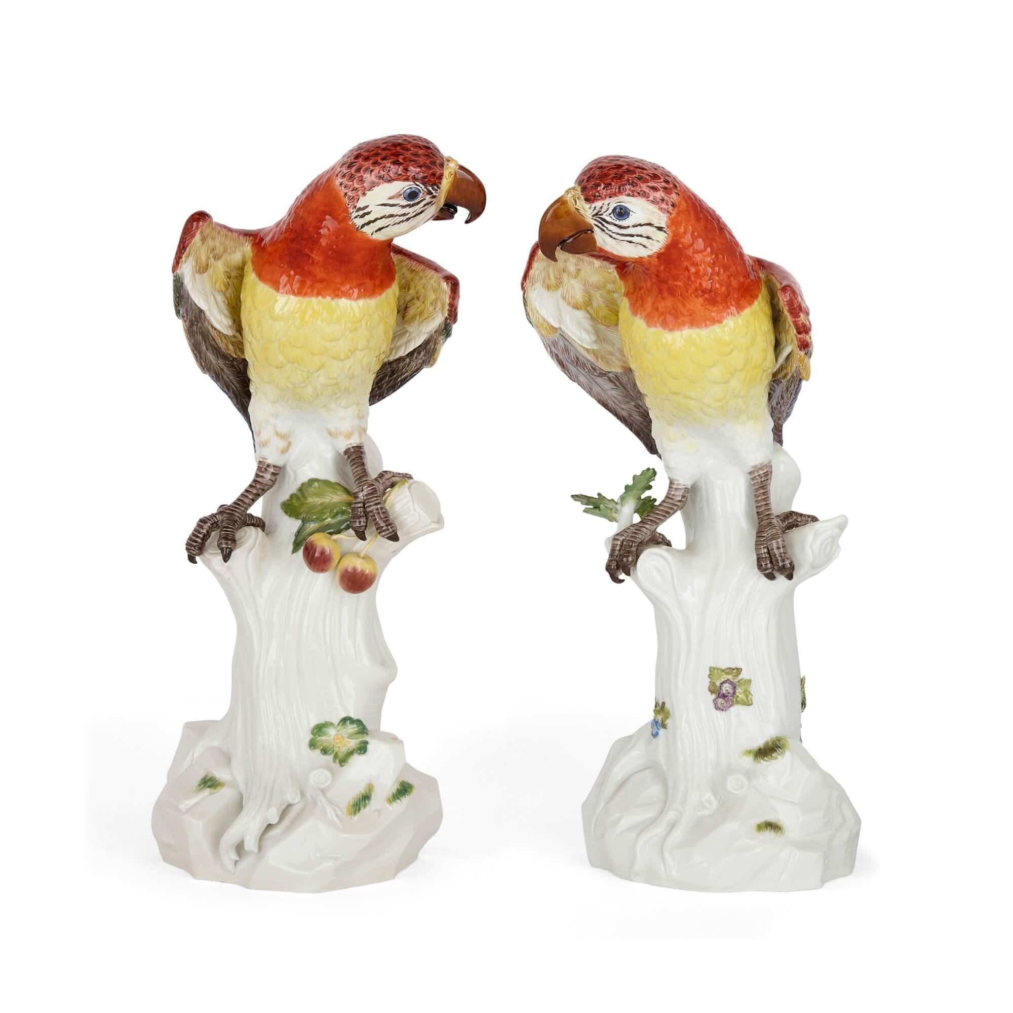 Pair of large Meissen models of parrots, circa 1986 and 1988
German, 20th century
Measures: Height 42/43cm, width 17cm, depth 21cm

Each naturalistically modelled and coloured, and perched on a tree-stump applied with leaves and flowers, and on