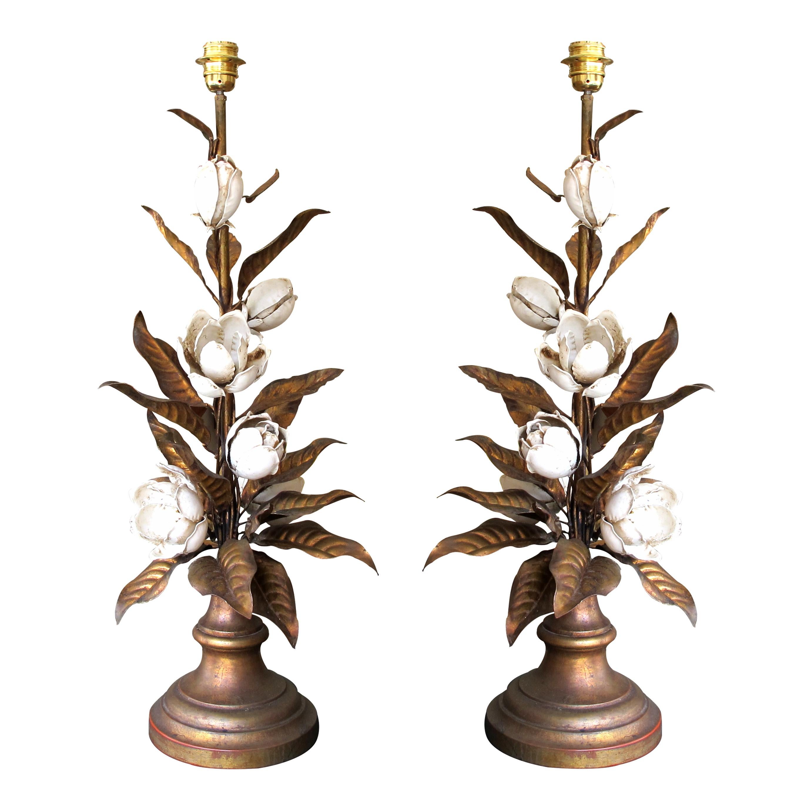 Pair of rare large, mid century, Italian highly-decorative floral toleware table lamps with bronze-coloured leaves and white painted flowers. Each lamp has been handcrafted individually with the flowers positioned in different places on each lamp.
