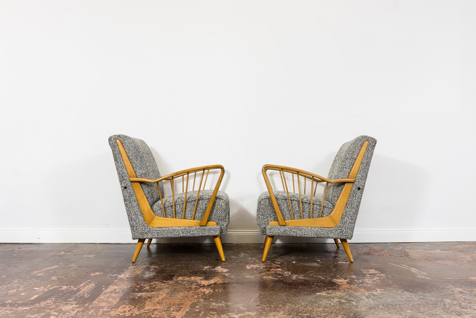 Pair of Mid-Century armchairs, 1950's, Germany.
Solid wood legs and harp-shaped armrest have been completely restored and refinished.
Reupholstered in black-grey-white woven fabric.