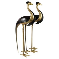 Paire de grandes sculptures d'oiseaux/cournes en bronze du milieu du siècle dernier