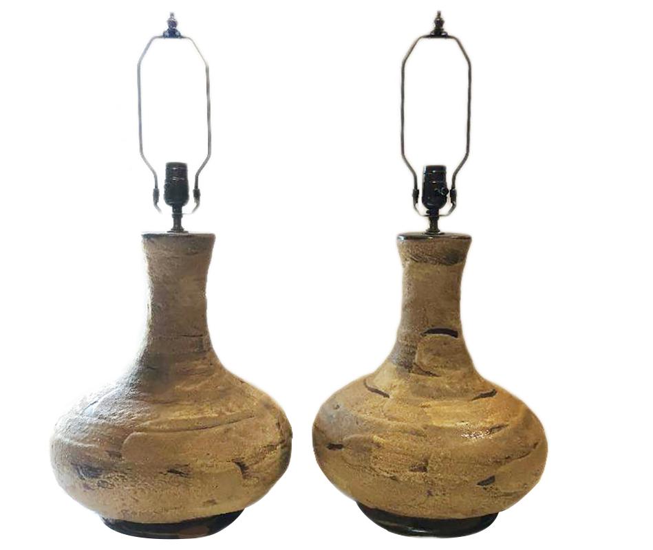Pair of large circa 1960s Italian ceramic table lamps with Raku style stone-colored glaze.

Measurements:
Height of body 20”
Widest point 13