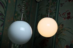 Pair of Large Midcentury Chrome and Opaline Glass Globe Pendants Lights