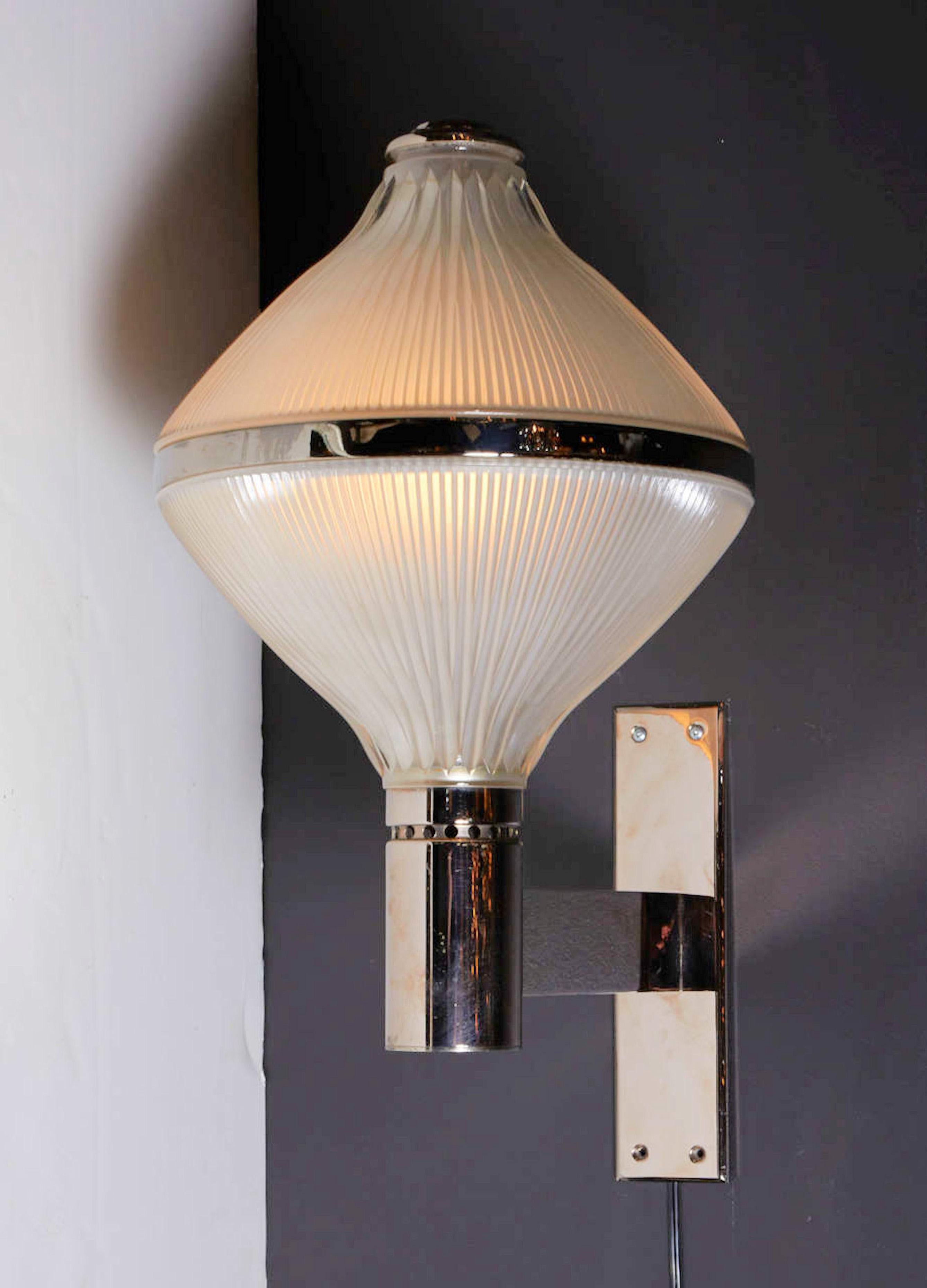 Pair of midcentury lanterns or wall sconces designed by Studio BBPR for Artemide, in Italy, circa 1960s.
With spherical domes and a modern Industrial inspired design.
Frosted glass up and down fully lighted, and silver plated mounts.
Rewired: 2