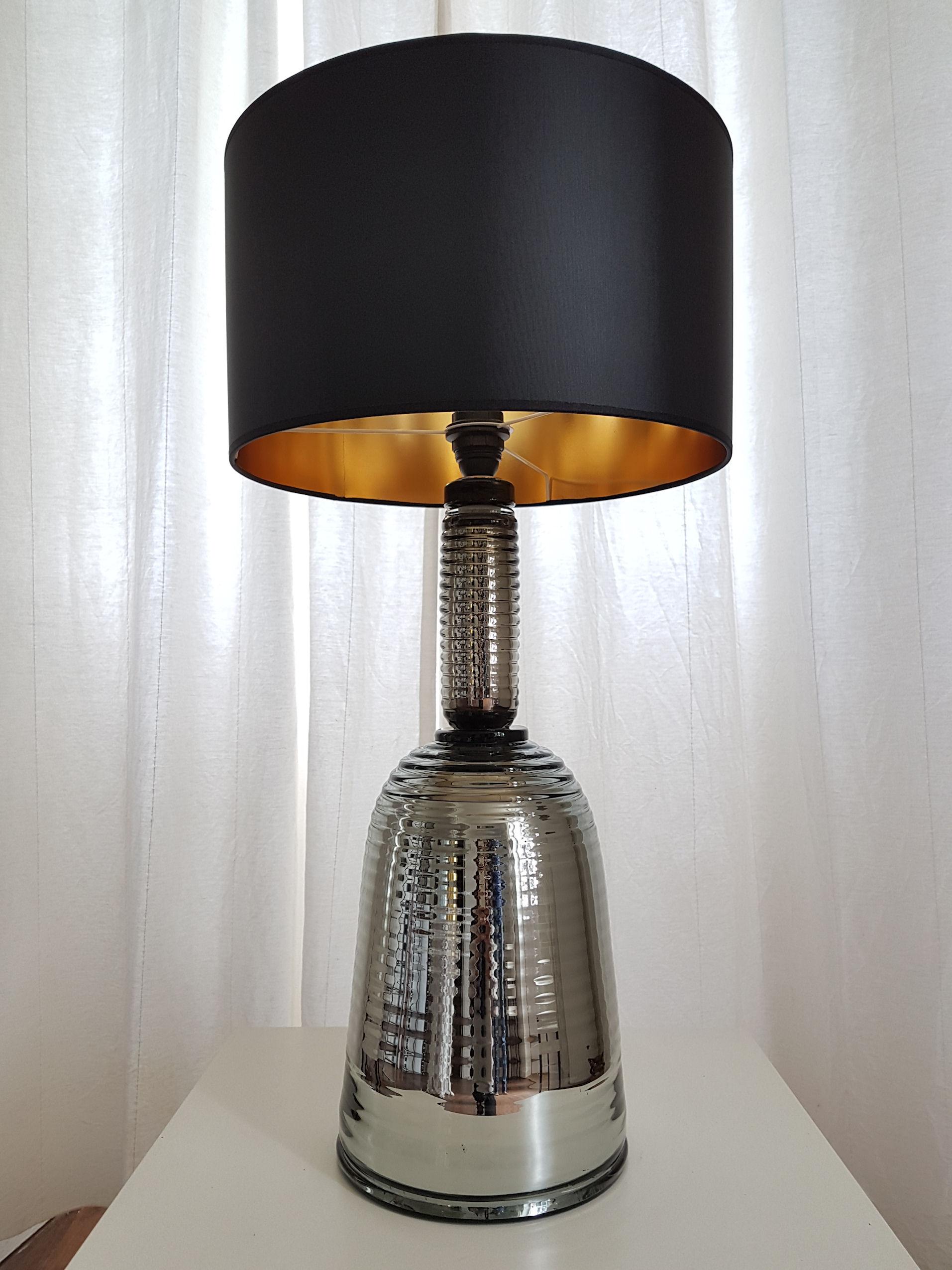Pair of large silver mirrored Murano glass lamps, early 1980s.
Italy, Mid-Century Modern style lamps.
1 light each, medium base, rewired for the US.
In excellent condition.
New black and gold fabric shades, sold separately.
