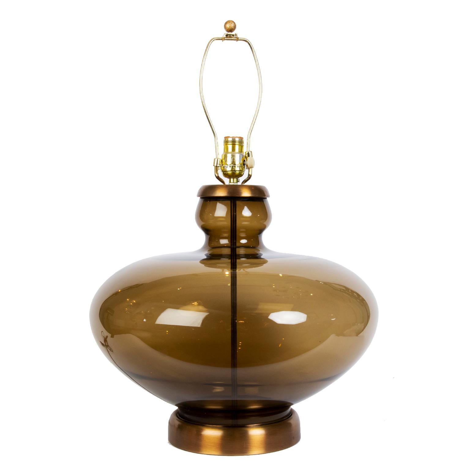 These gorgeous large exotic urn shaped vintage smoked glass lamps with an antique brass metal base and cap are fitted with new shades (optional) and a dimmer switch.