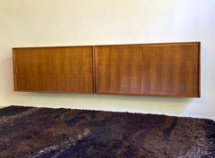 Pair of large mid century walnut wall hung floating cabinets - credenza