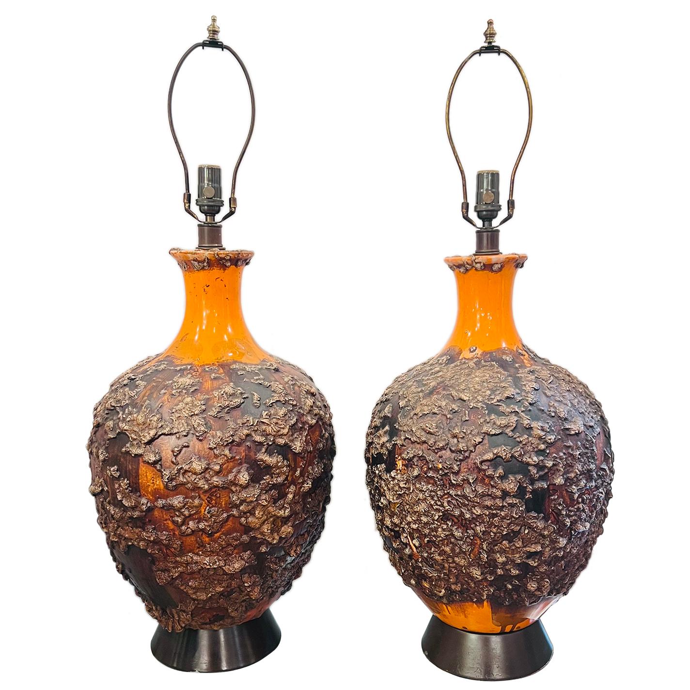 Pair of midcentury Italian porcelain table lamps with glazed finish.

Measurements:
Height of body: 22