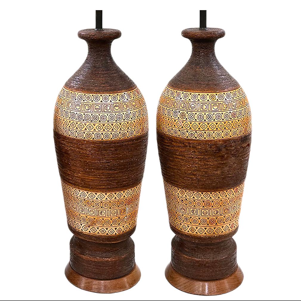 Pair of circa 1950's Italian ceramic table lamps with abastract decoration.

Measurements:
Height of body: 24