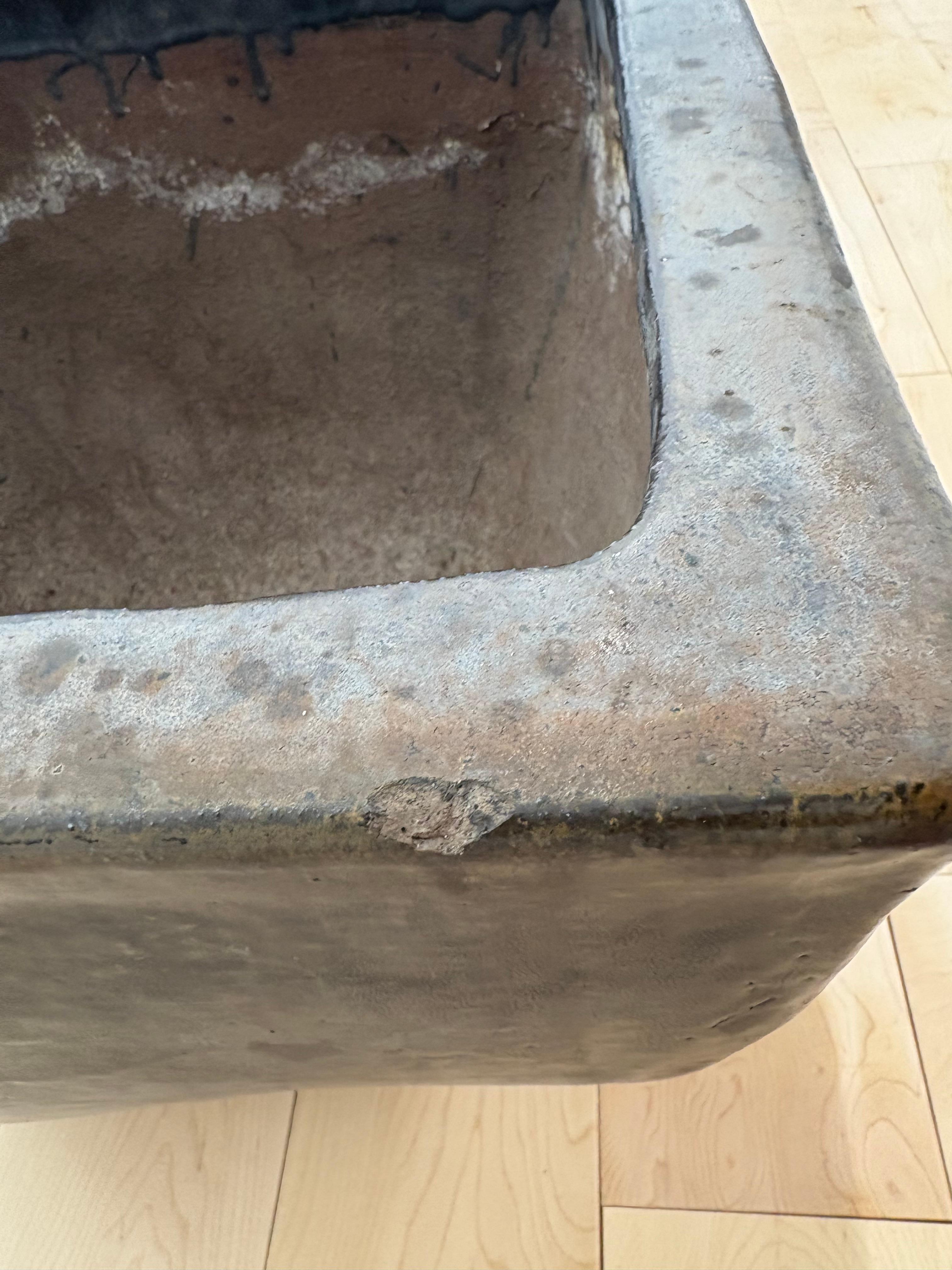 Contemporary Pair of large minimalist modern cast iron planters with deep metallic glaze For Sale