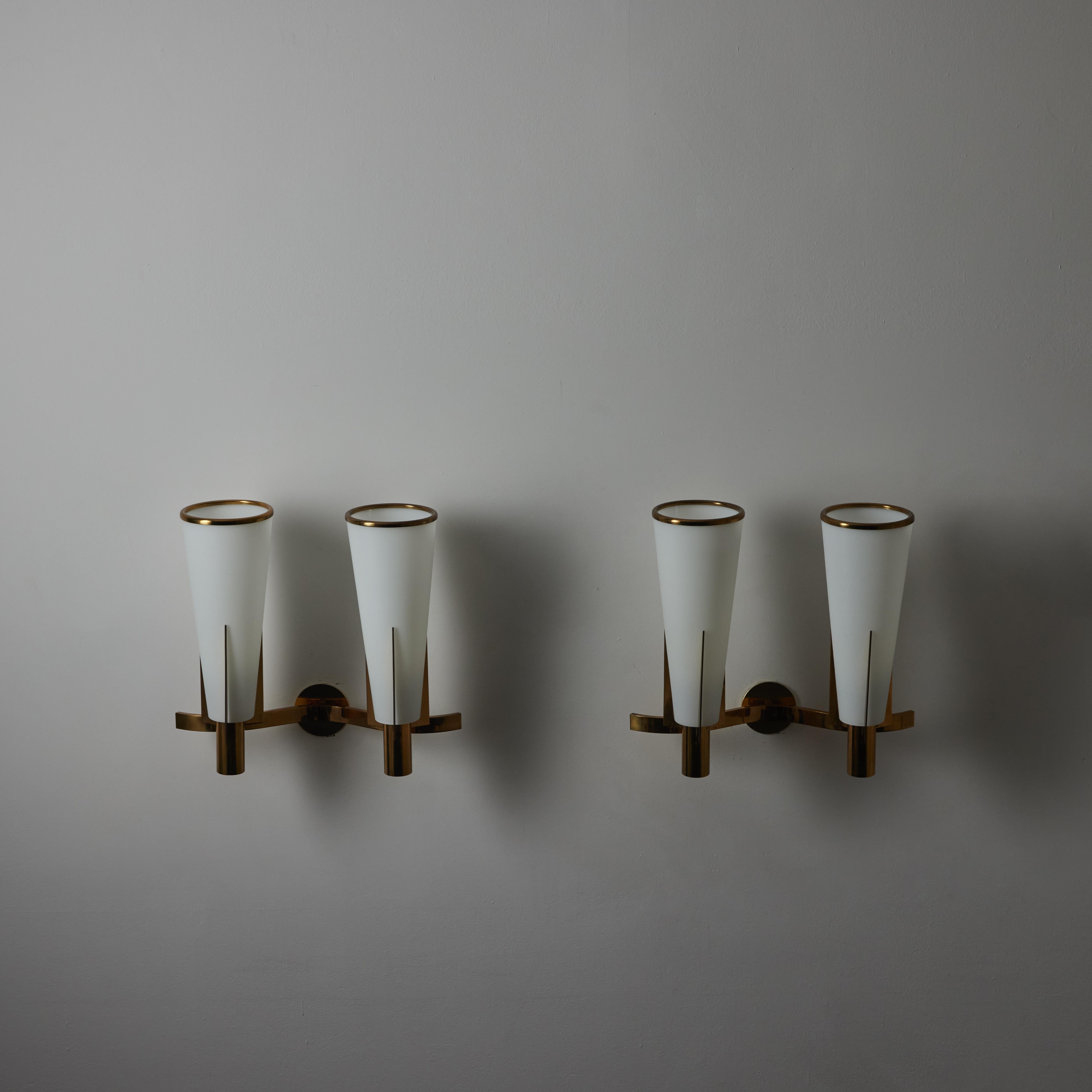 Patinated Pair of Large model 2021/2 Sconces by Stilnovo