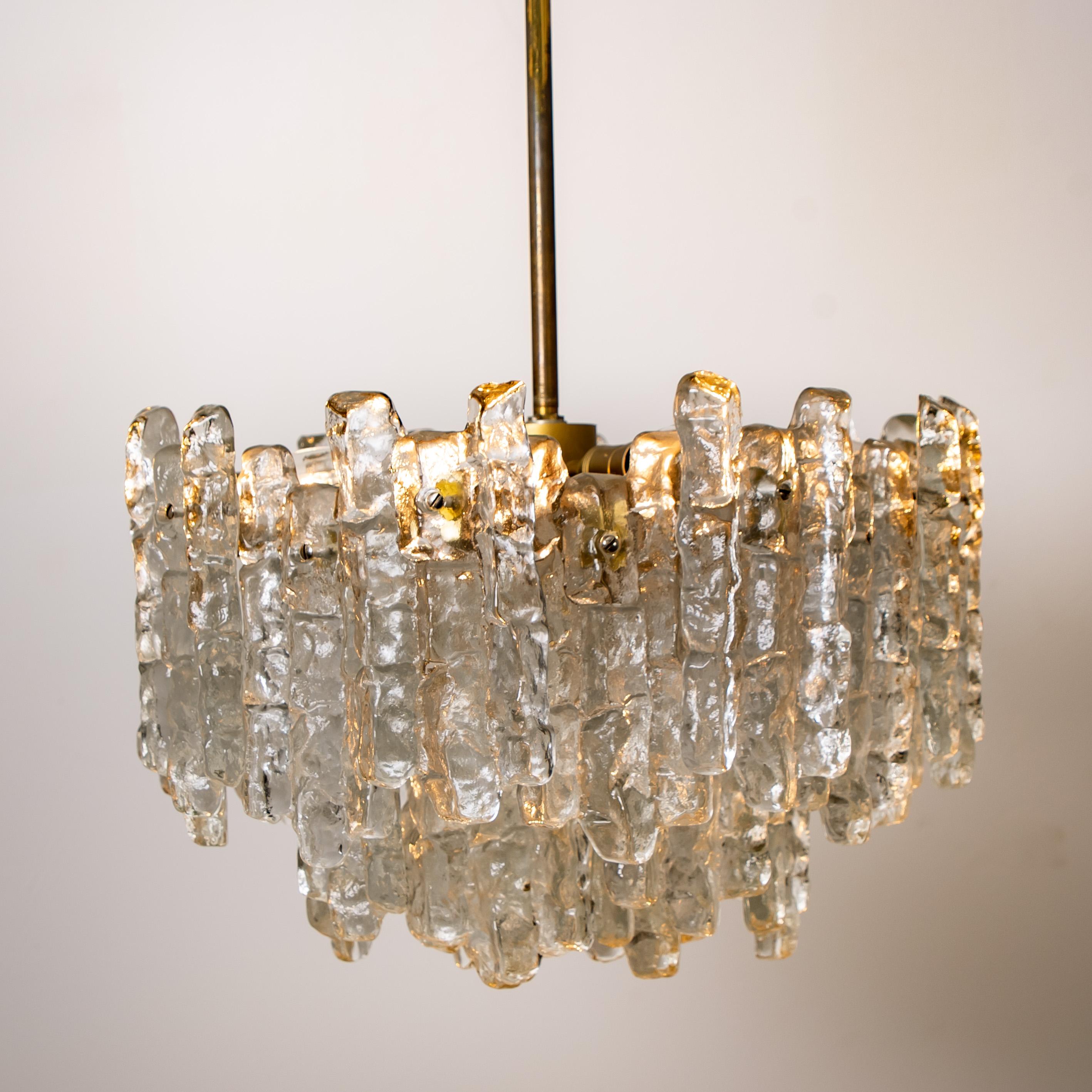 Mid-Century Modern Pair of Large Modern Three-Tiered Brass Ice Glass Chandeliers by J.T. Kalmar For Sale