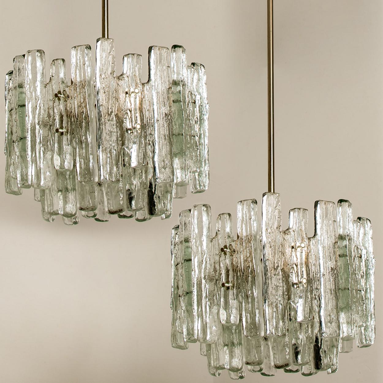 Steel Pair of Large Modern Three-Tiered Chrome Ice Glass Chandeliers by J.T. Kalmar For Sale