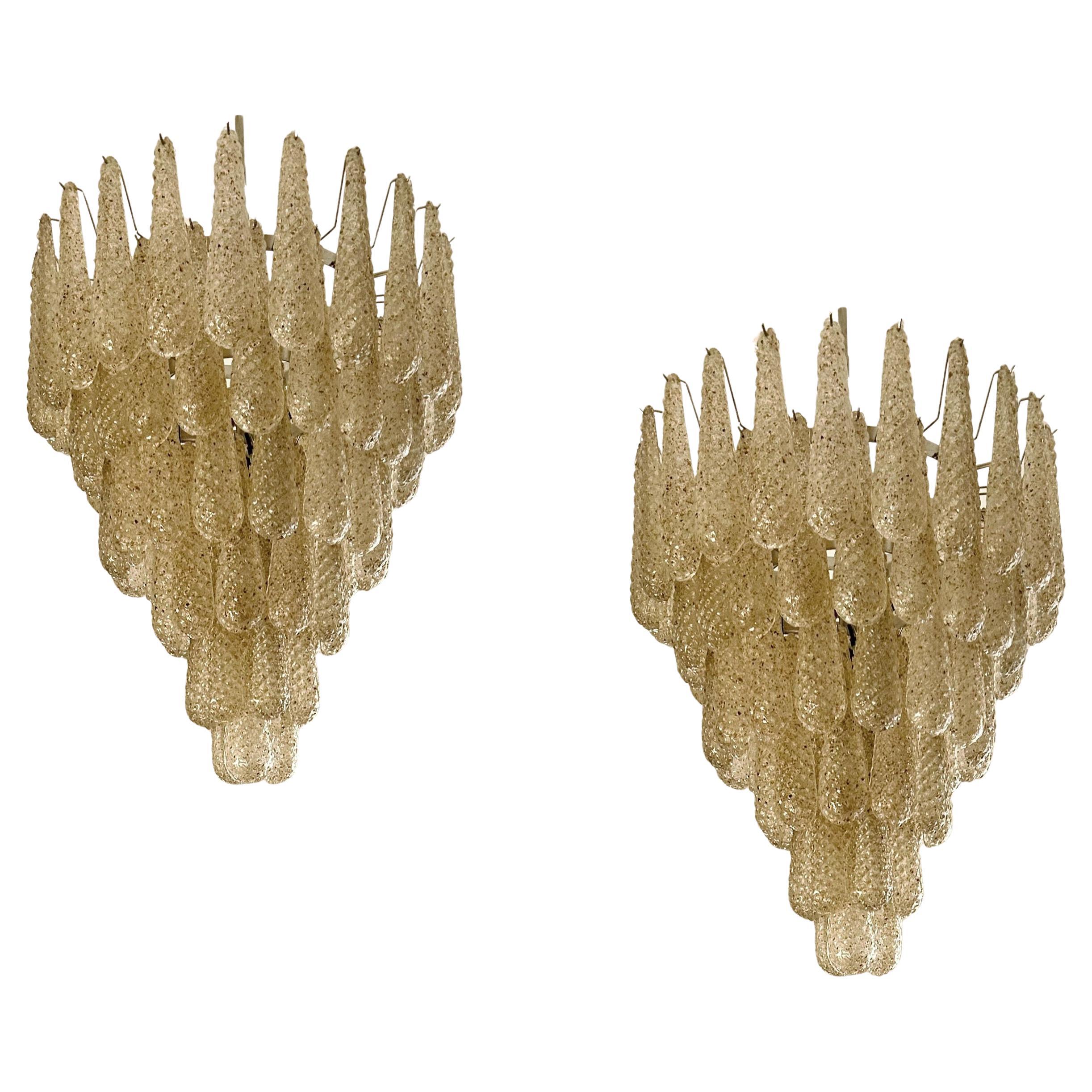 Pair of Large Murano Chandeliers in the of style of Venini in amber tone.