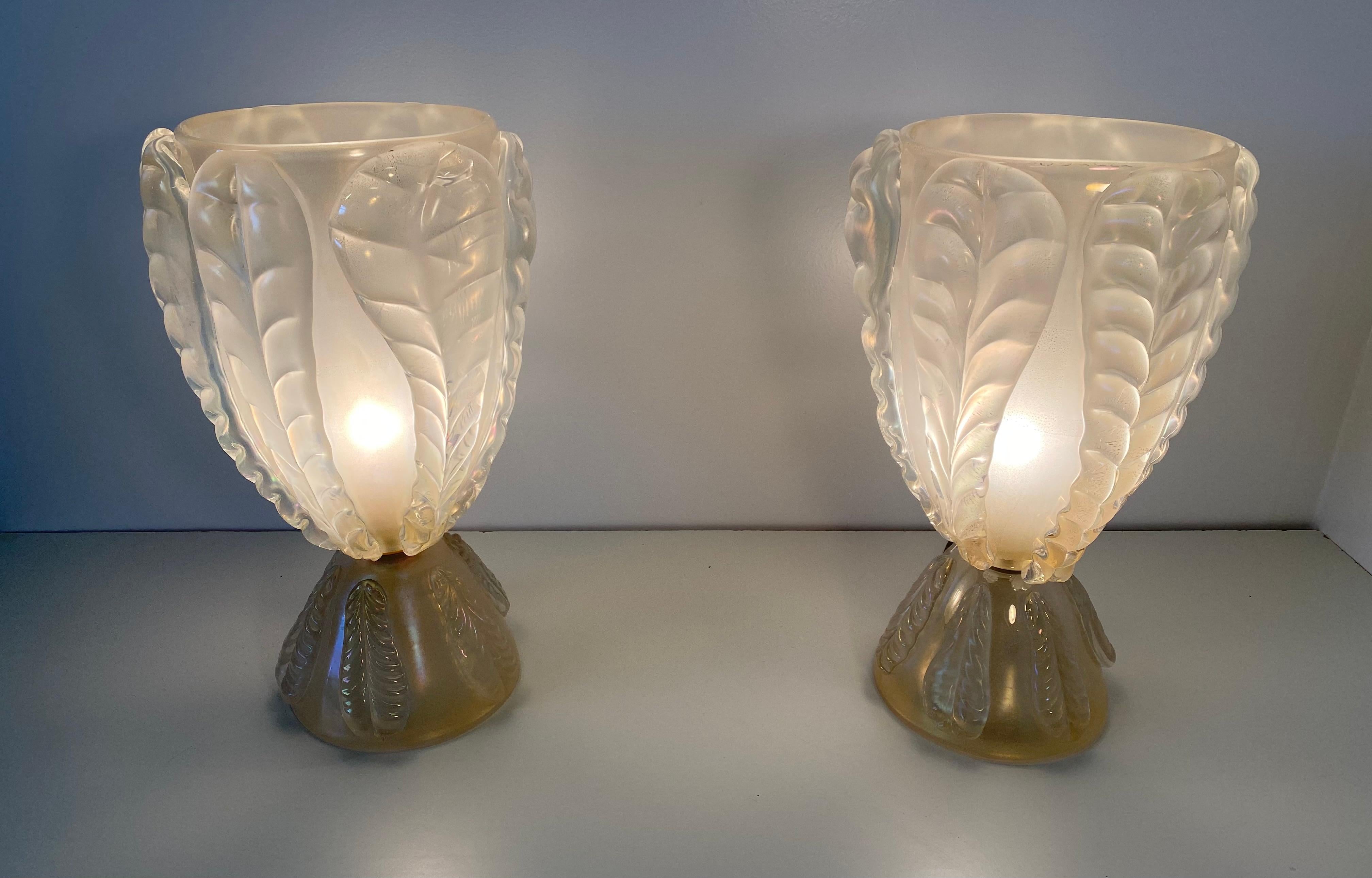 This impressive pair of glass lamps were produced in Murano in the early 2000s.
They are entirely in glass with a spectacular iridescent color.
Perfect conditions.