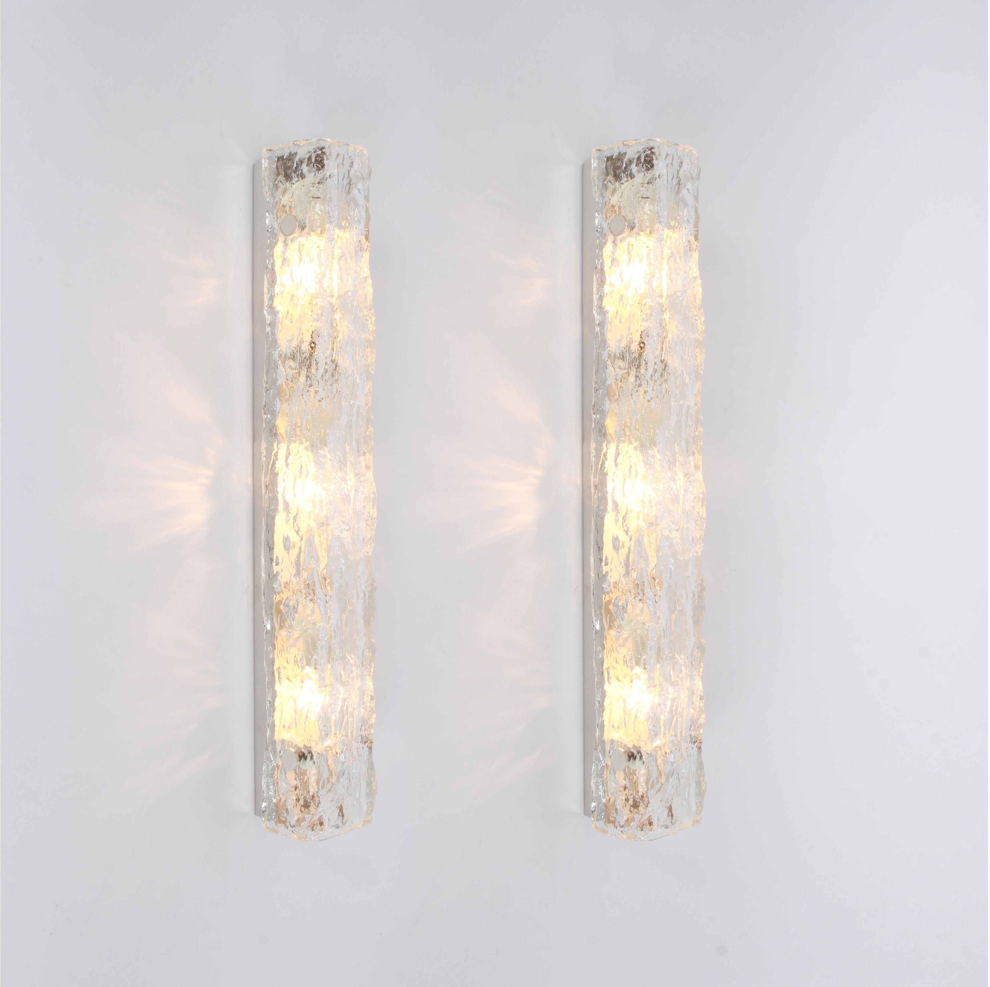 Gorgeous pair of Murano glass sconces by Kaiser Leuchten, Germany, circa 1970s.

High quality and in very good condition. Cleaned, well-wired and ready to use. 

Each sconce requires 3 x E14 Standard bulbs.
Light bulbs are not included. It is