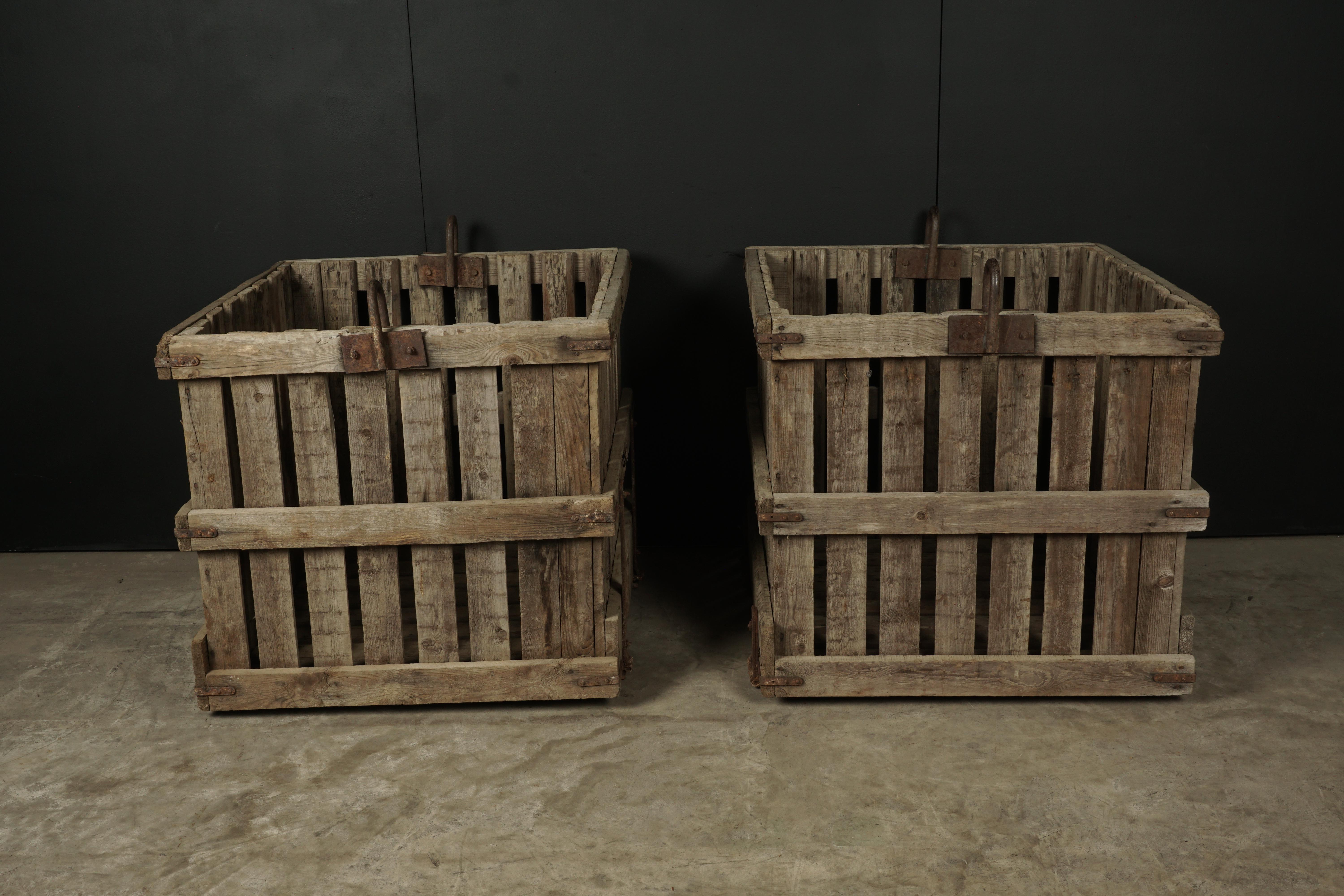 Large pair of oak shipping crates from France, circa 1940. Solid construction with iron detail. Would make fantastic large planters. Presumably from a shipyard.