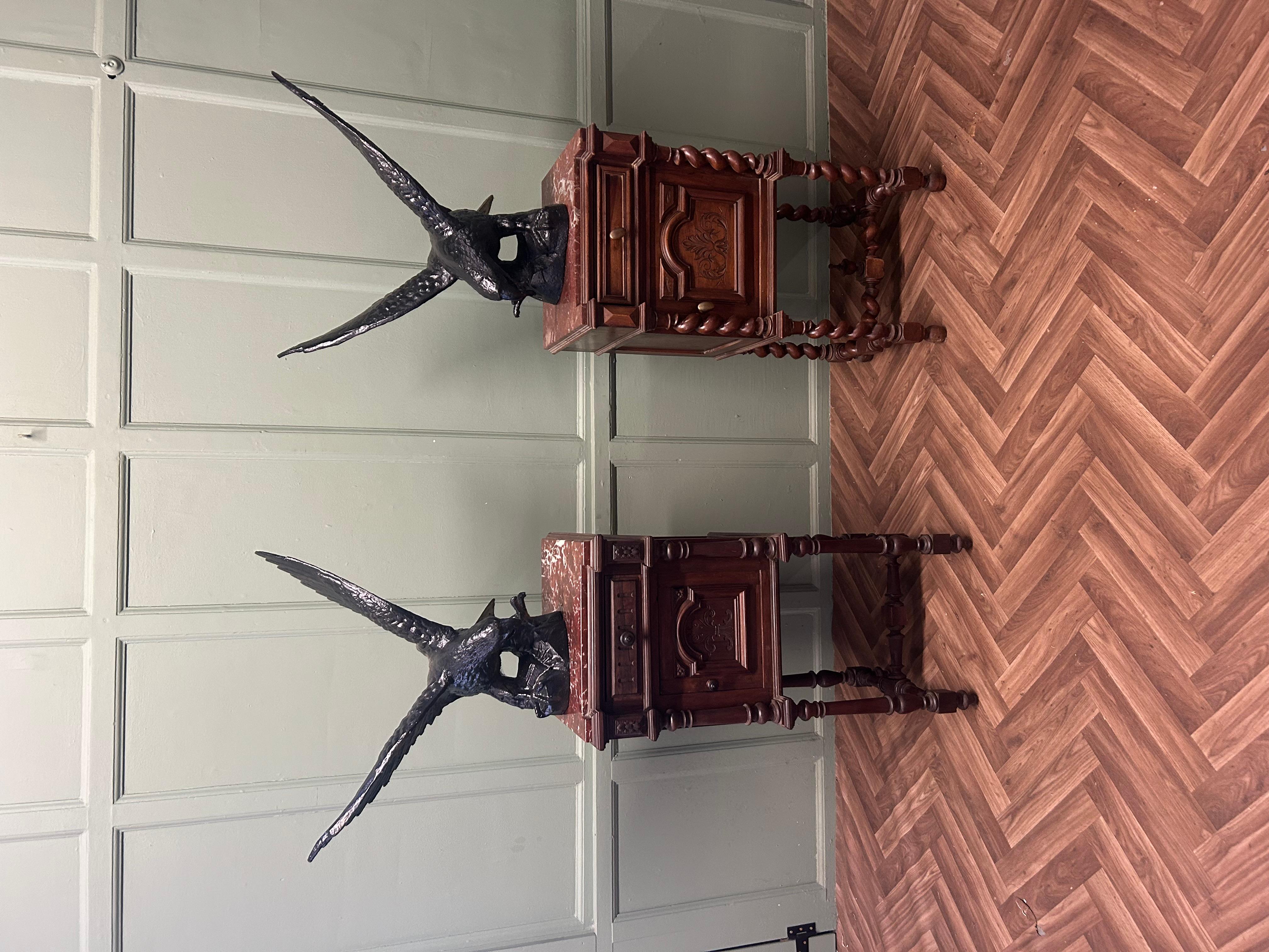 Pair of Large Old Iron Eagle Statues or Pillar Caps 


A Pair of Large Old Weathered Eagle Statues originally  Pillar Caps, these are lovely old Eagles, they have beautiful detail to the feathering and the facial expressions

These are heavy pieces