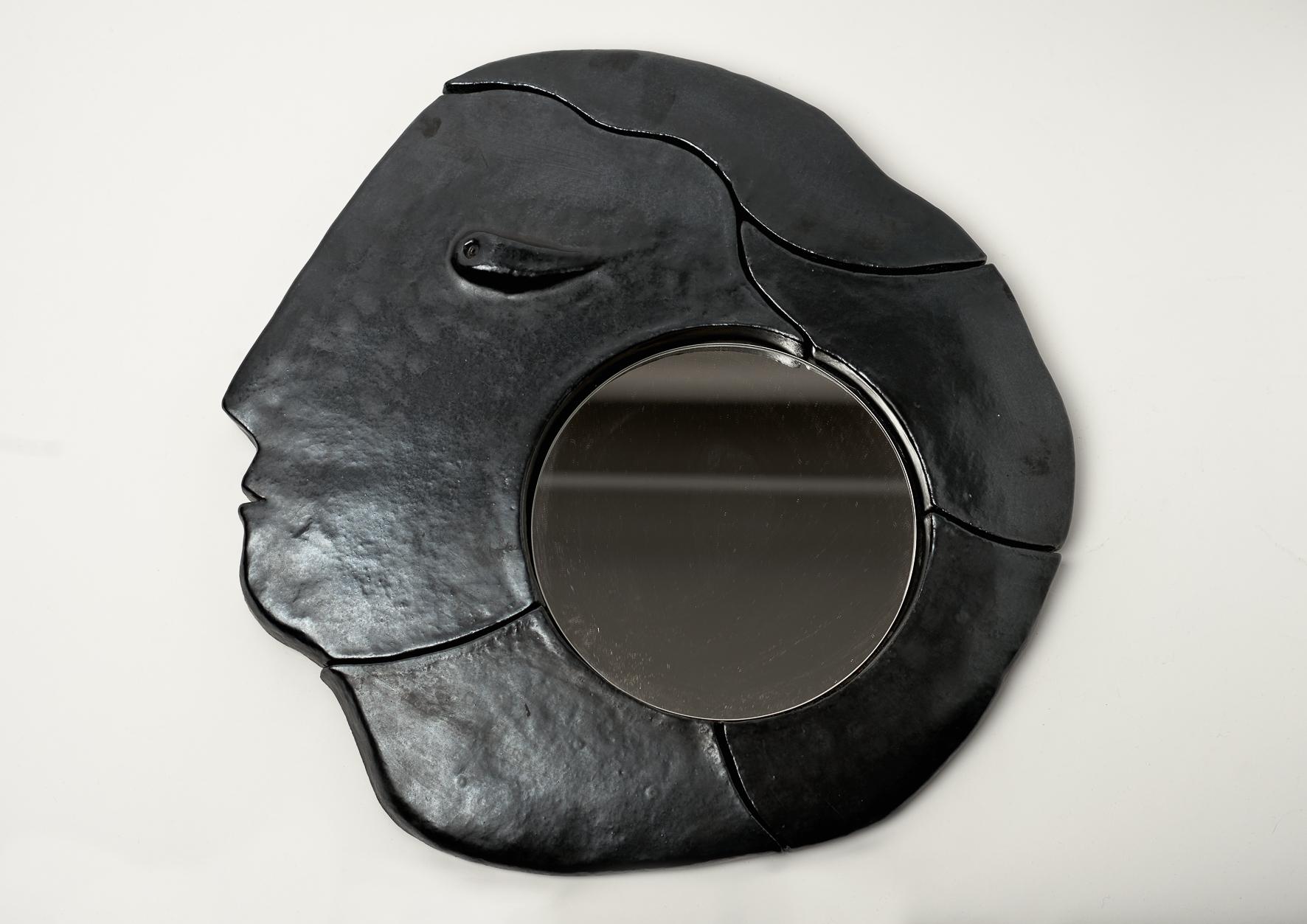 2 Large hand-sculpted ceramic mirrors with stylized profile faces, stoneware glazed in black enamel.

One of a kind handmade piece signed by the French ceramicists DaLo, 2018.



