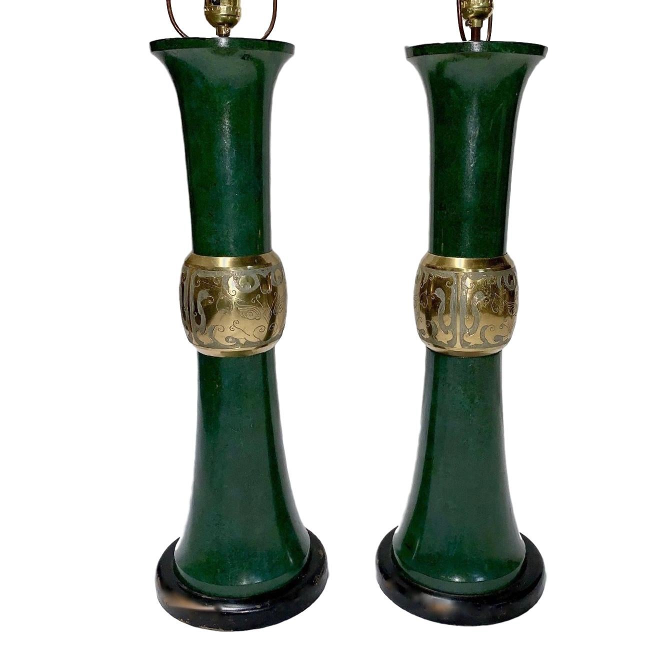 A pair of 1960s Italian patinated and lacquered bronze table lamps with Asian motif.

Measurements:
24