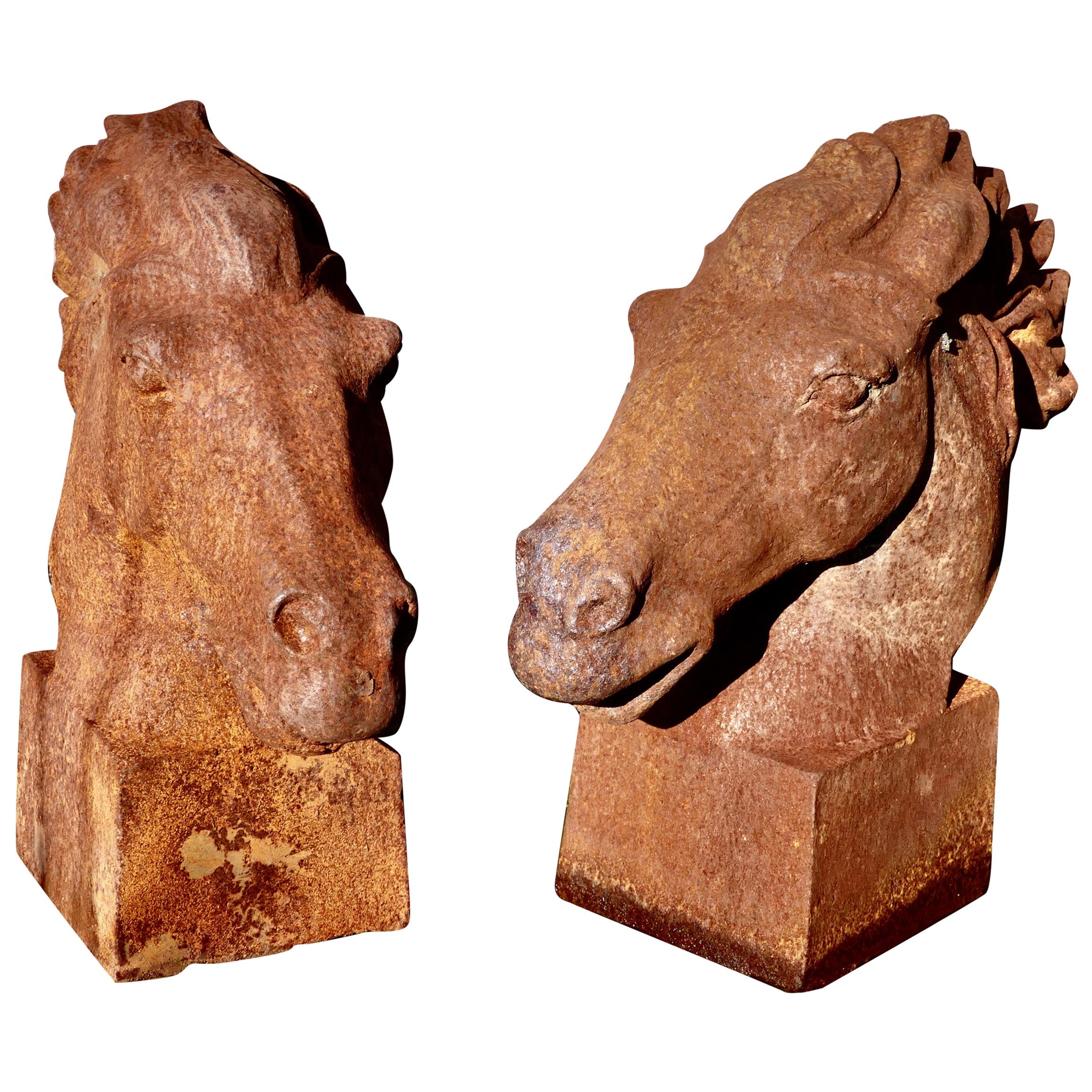 Pair of Large Outdoor Weathered Cast Iron Horse Heads