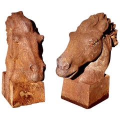 Pair of Large Outdoor Weathered Cast Iron Horse Heads