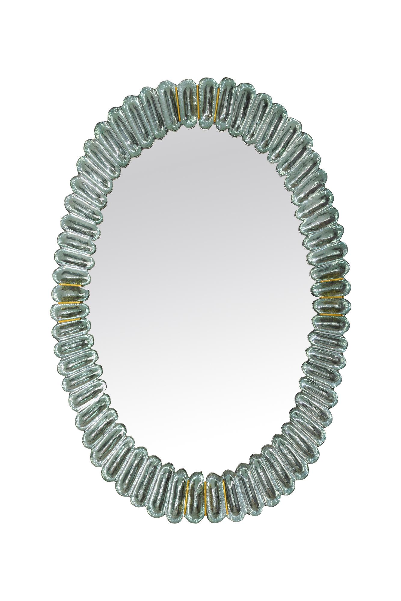 Pair of Large Oval Aqua Murano Glass Mirror, in Stock
Contemporary oval mirrors with scalloped aqua Murano glass frames and brass accents. Handcrafted by a team of artisans in Venice, Italy.
Can be easily hung vertically or horizontally with metal