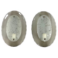 Paire de grandes appliques ovales incurvées en verre de Cristal Art. Italie années 1960