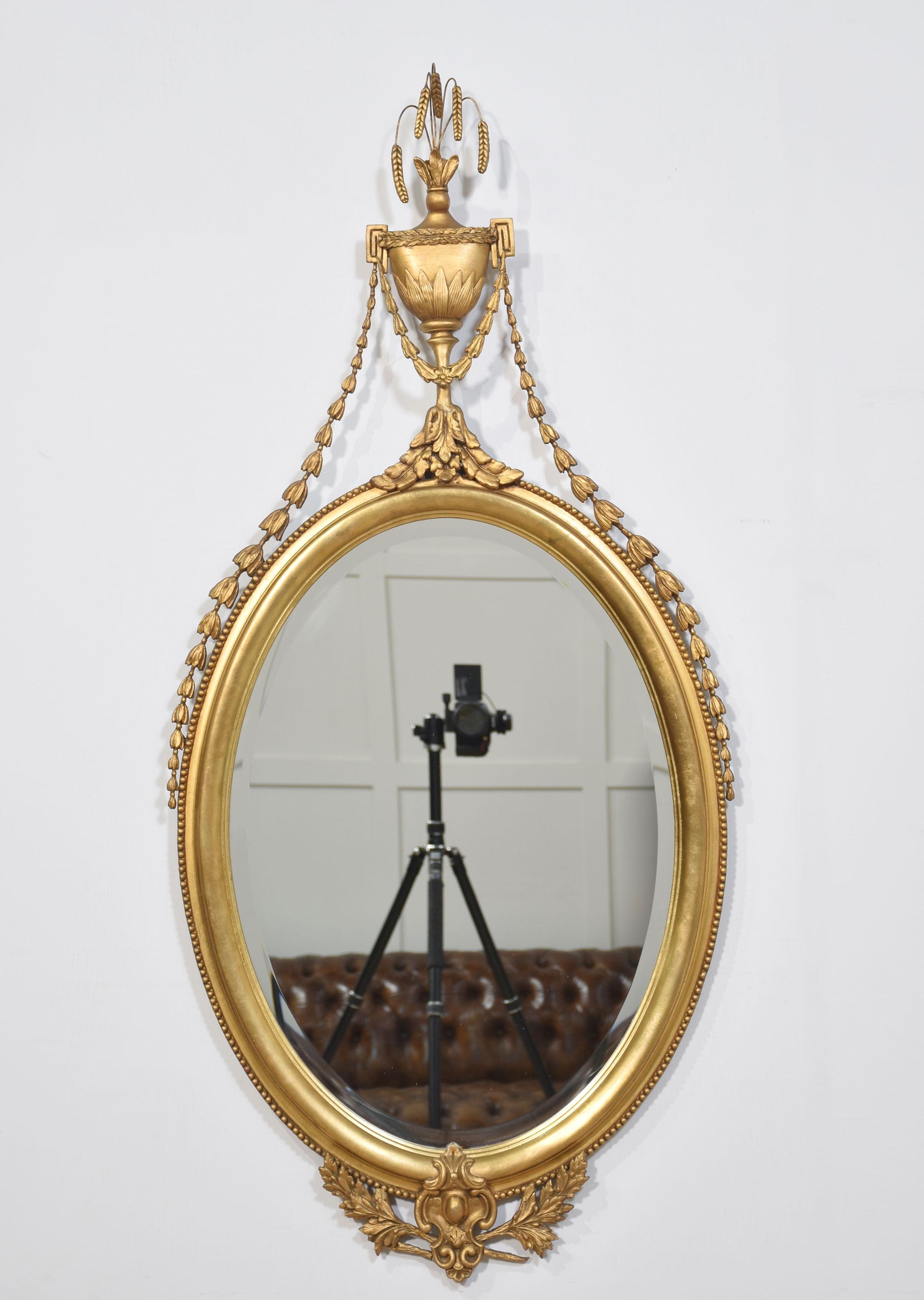 British Pair of large oval wall mirrors For Sale