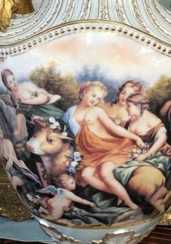 Pair Of Large Painted European Porcelain Urns with Gold Handles