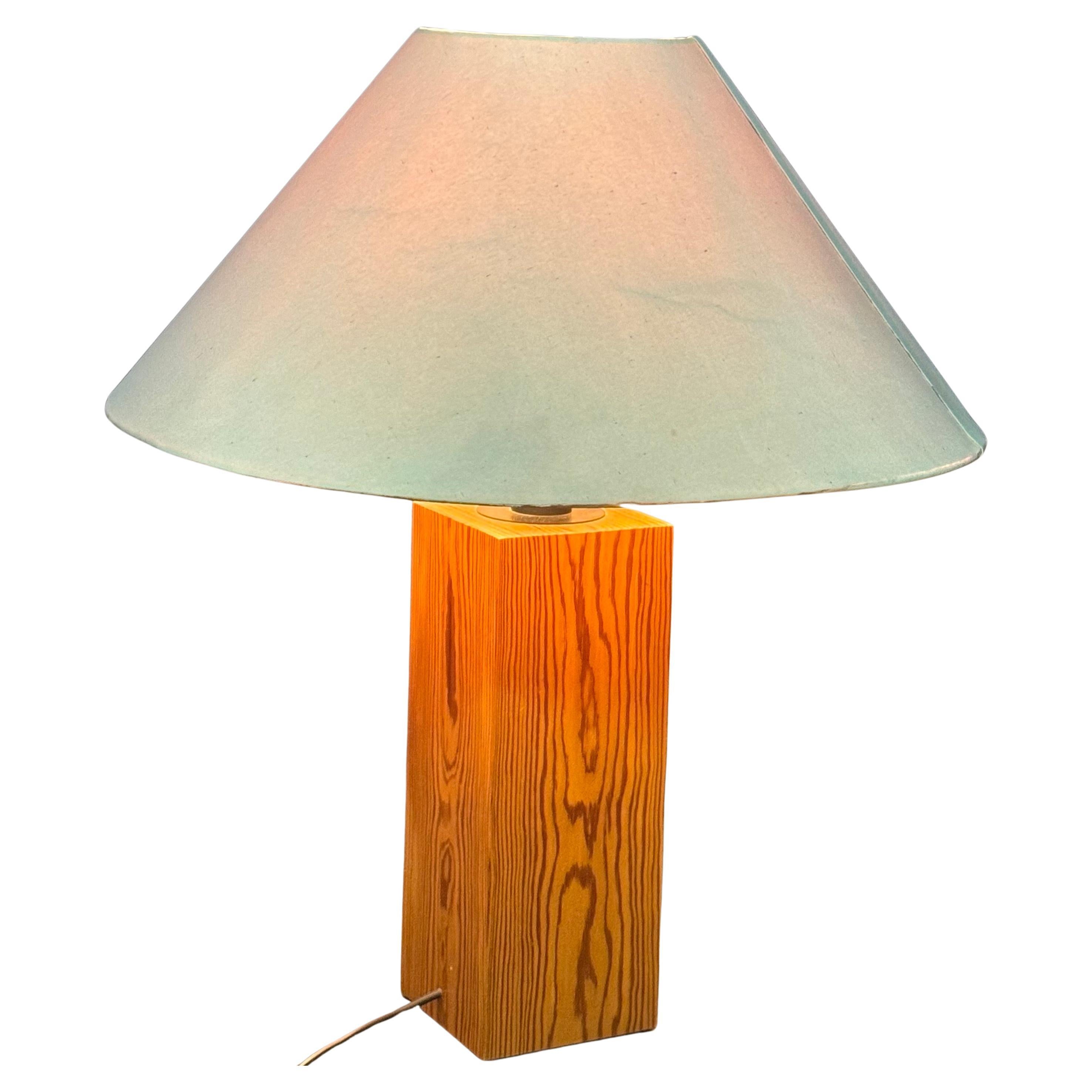Large pine table lamp by Ingo Maurer for Design M, 1970s, Germany. Executed in stained pine and linen shades.
Socket:  1 x E27 or E26 (US) for standard screw bulbs. Max. 75 Wattage per bulb.
(Pair available*)

