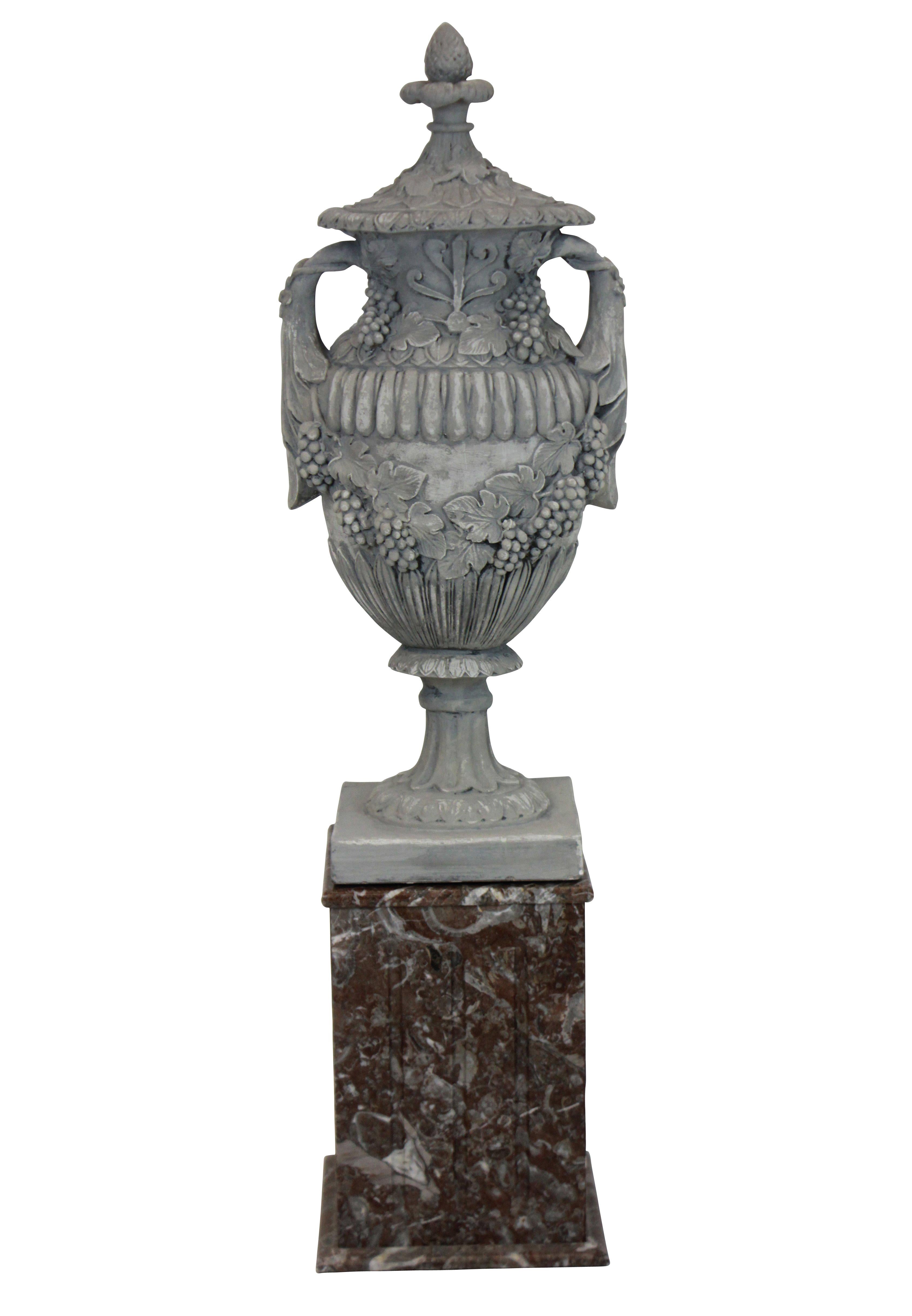 Pair of Large Plaster Urns on Marble Plinths 1