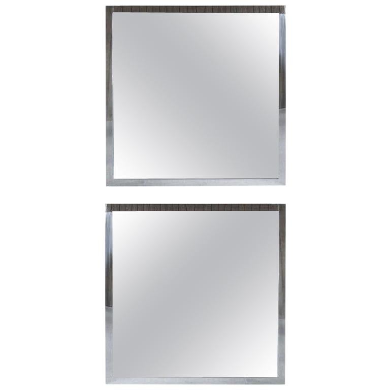 Steel frame with polished chrome finish. The mirrors have a solid weighted frame.