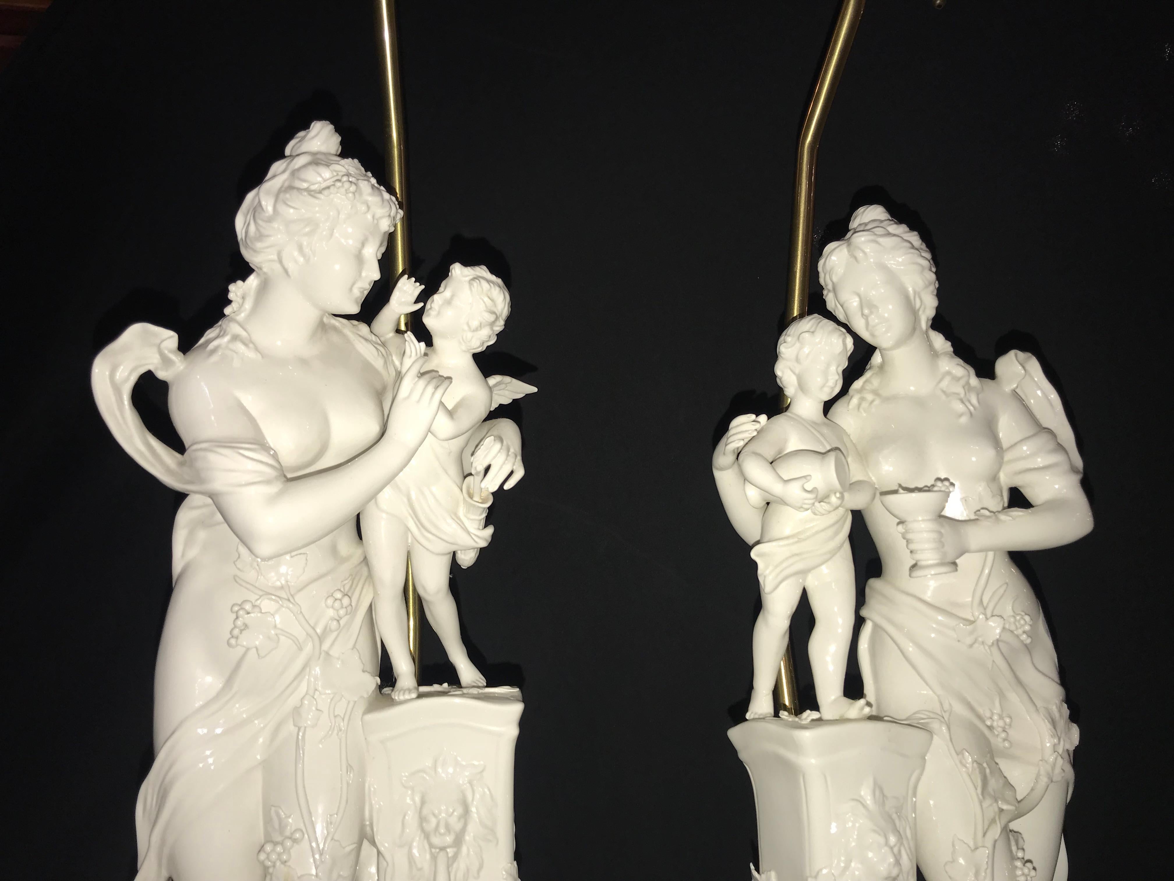 Pair of Large Porcelain Figural Opposing Bare Brested Woman & Angel Table Lamps (Französisch)