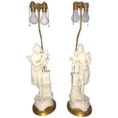 Vintage Pair of Large Porcelain Figural Opposing Bare Brested Woman & Angel Table Lamps